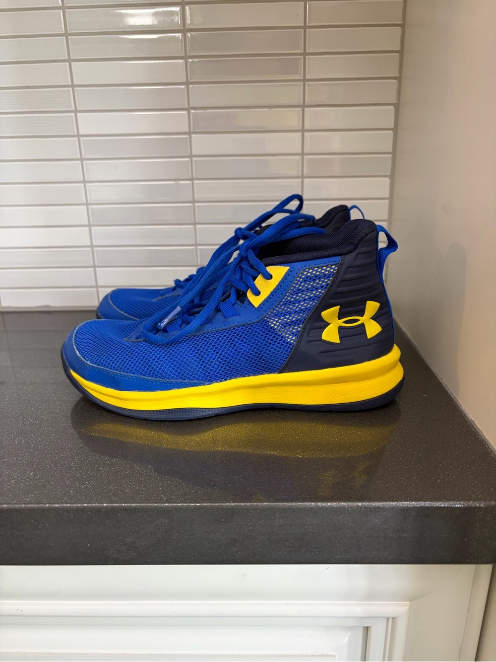Under Armour boys blue and yellow sneakers